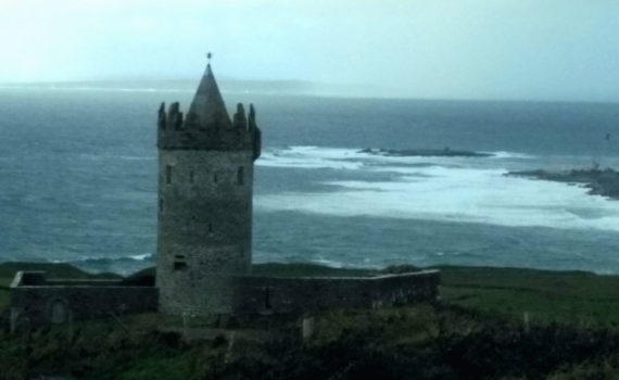 View of Castle Ruin Overlooking Atlantic Ocean Near Doolin Ireland